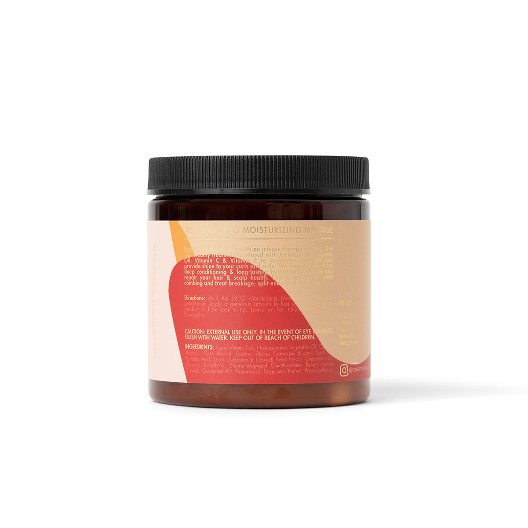 Bagsiden af en As I Am Jamaican Black Castor Oil Moisturizing Masque (227 g) med en lyserød og beige etiket, der indeholder instruktioner og ingrediensliste.