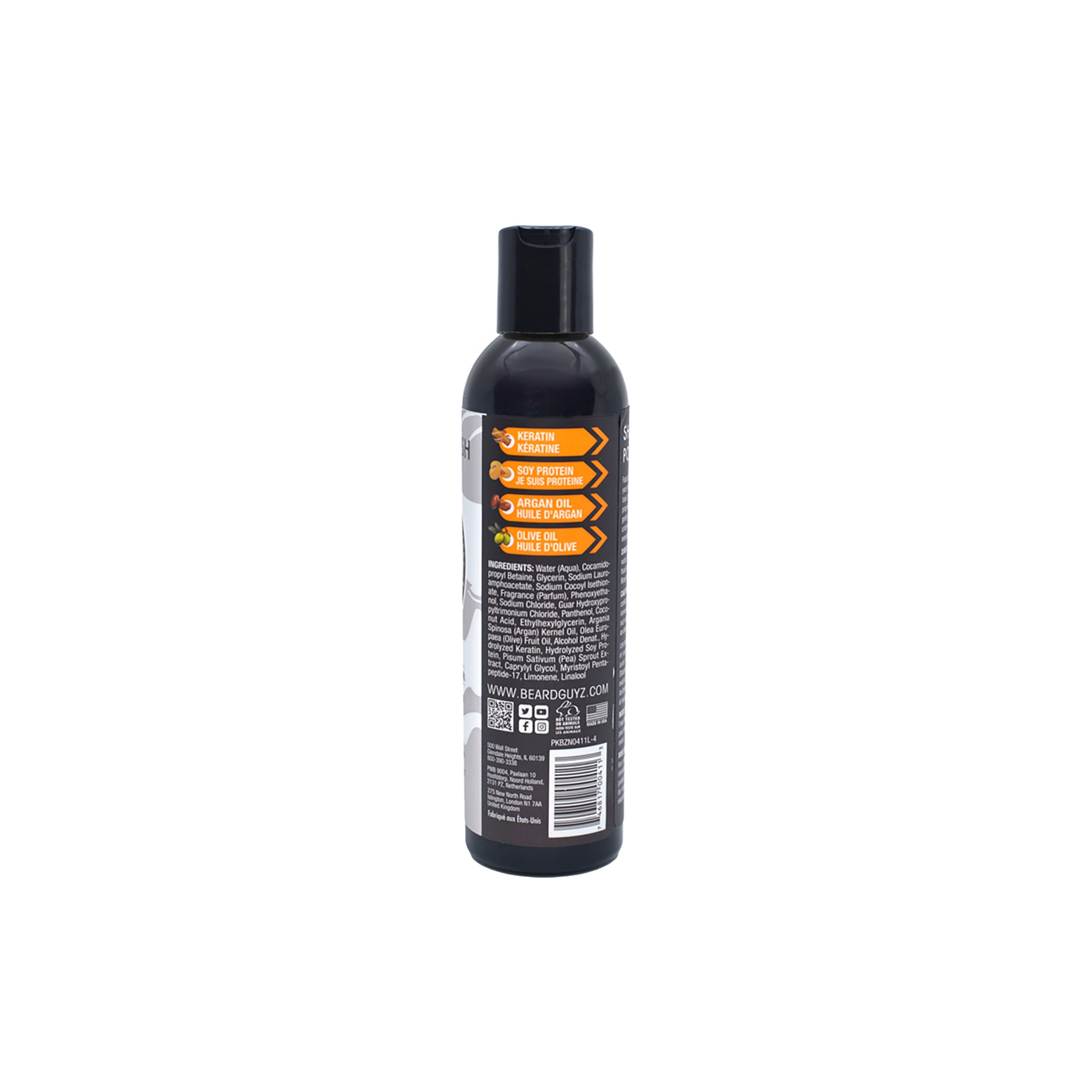 Bagside af en sort plastikflaske med Beard Guyz skægshampoo. Flasken har en sort skruekapsel og en hvid etiket med produktoplysninger, herunder ingrediensliste og brugsanvisning.