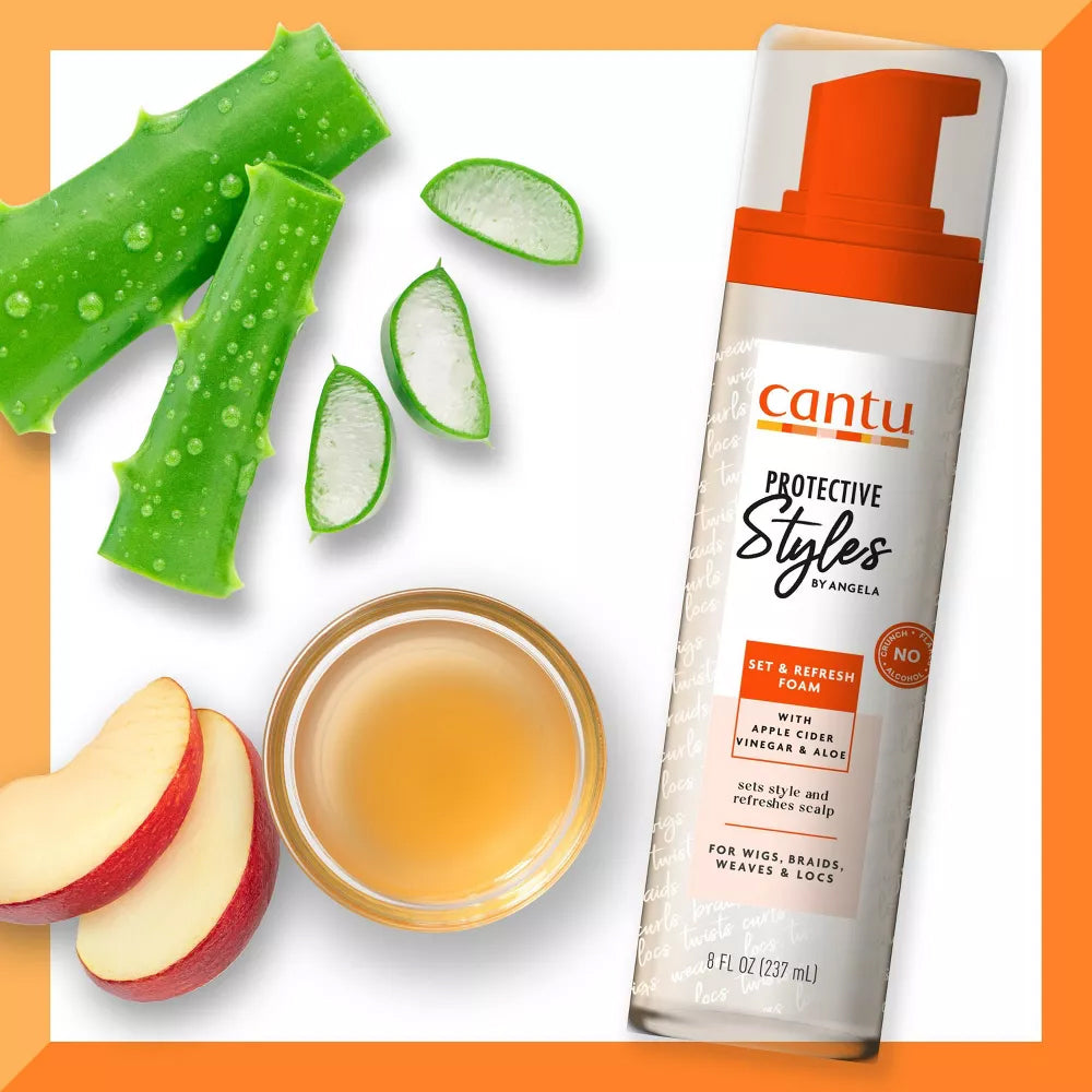 Billede af Cantu Protective Styles skum flankeret af aloe vera og æblecidereddike, dets hovedingredienser.