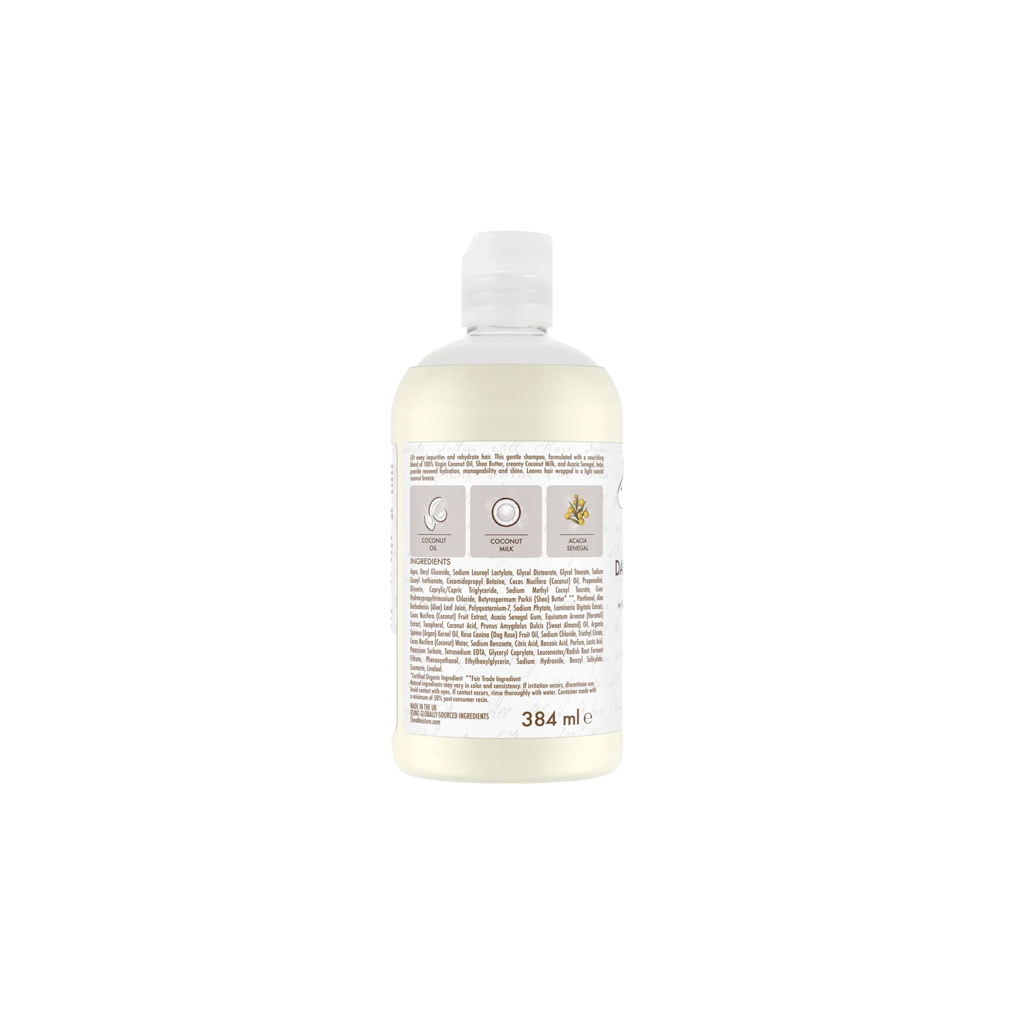 Bagside af en 384ml flaske med Shea Moisture 100% Virgin Coconut Oil Daily Hydration Shampoo. Etiketten viser ingredienser, herunder kokosolie, kokosmælk og akaciegummi, og beskriver produktet som nærende og fugtgivende.