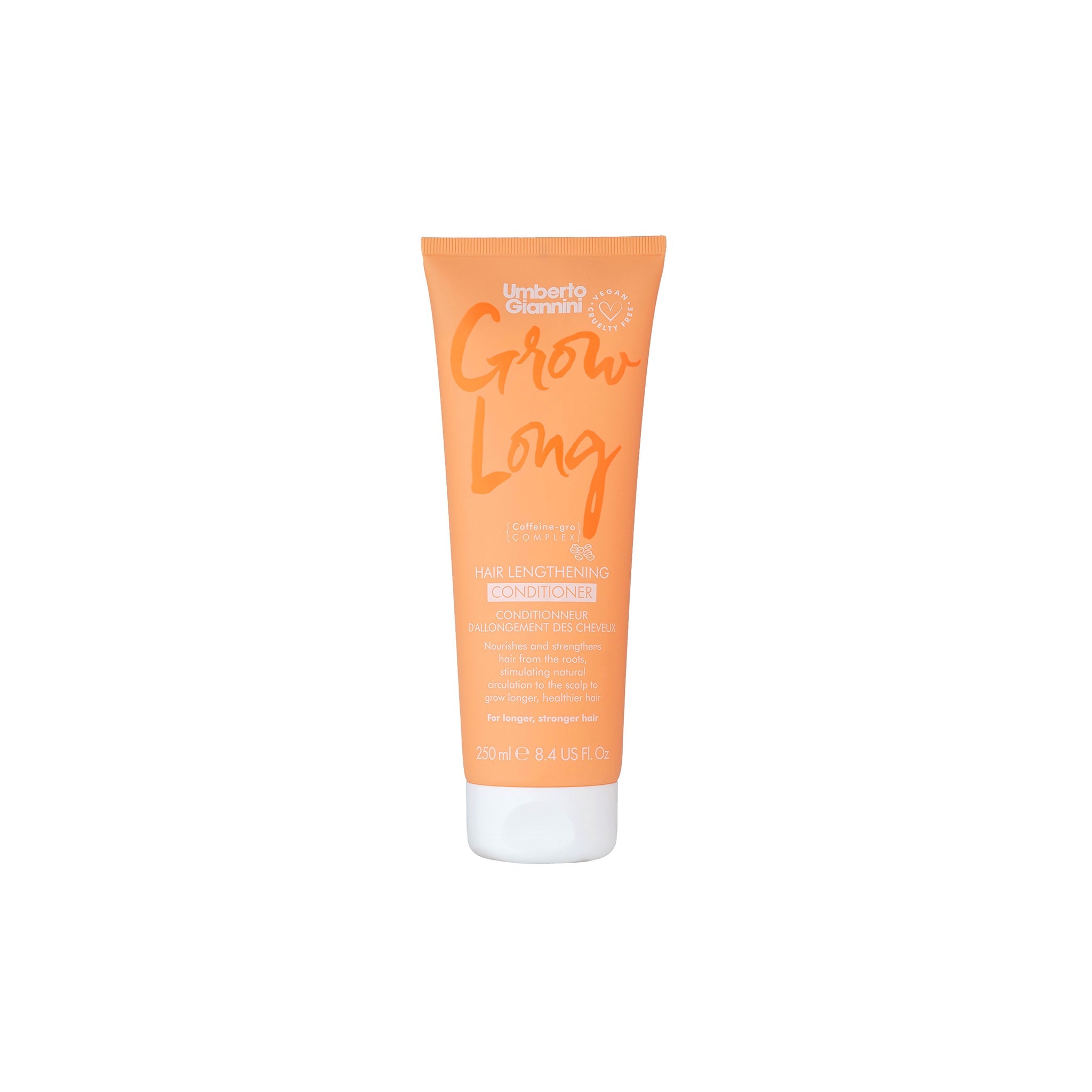 Umberto Giannini Grow Long conditioner i orange tube med hvid hætte, designet til at fremme længere og stærkere hår.