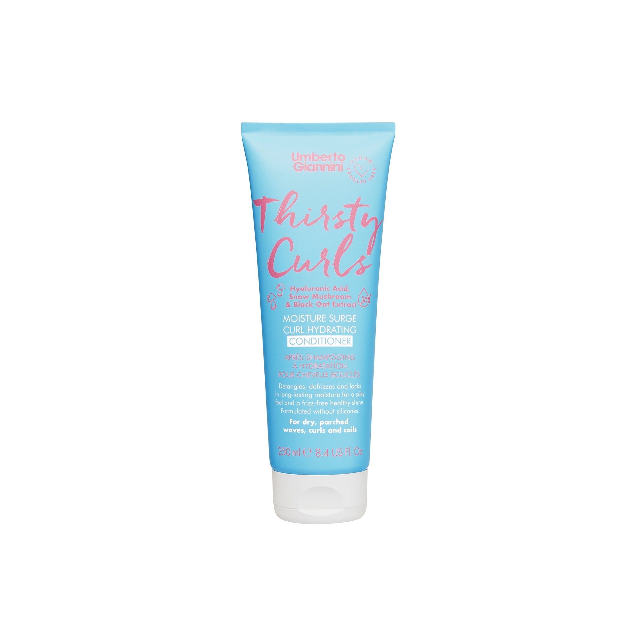 Blå tube med Umberto Giannini Thirsty Curls Moisture Surge Curl Hydrating Conditioner til krøllet og tørt hår på hvid baggrund.